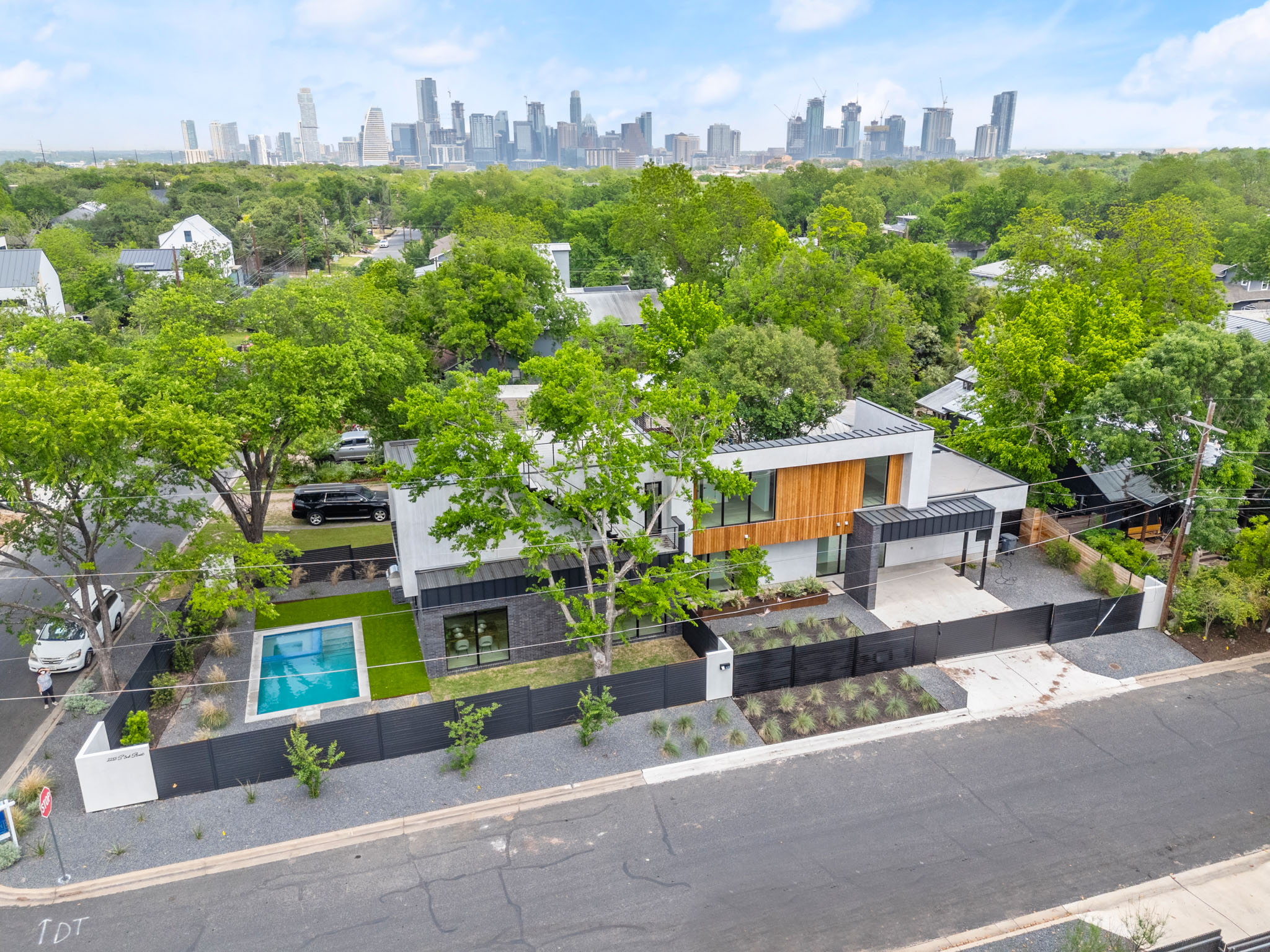 2215 South 3rd Street Austin, TX 78704 - Photo 35 of 38 an aerial view of a house with a garden and plants