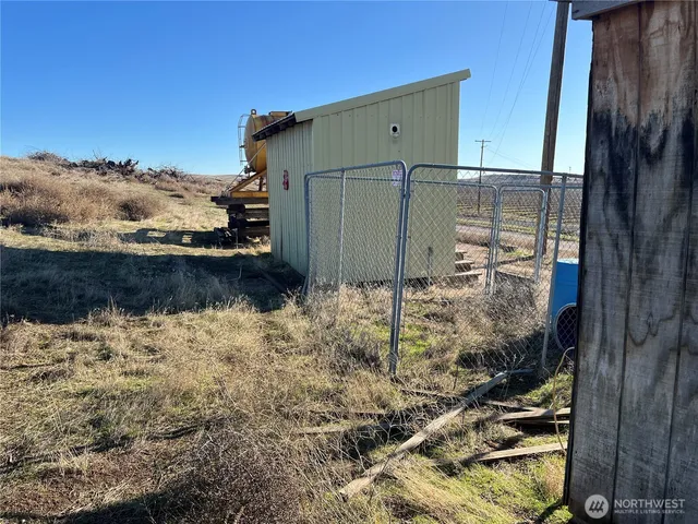 a view of balcony with furniture