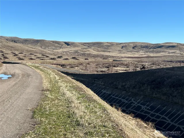 a view of ocean and mountains