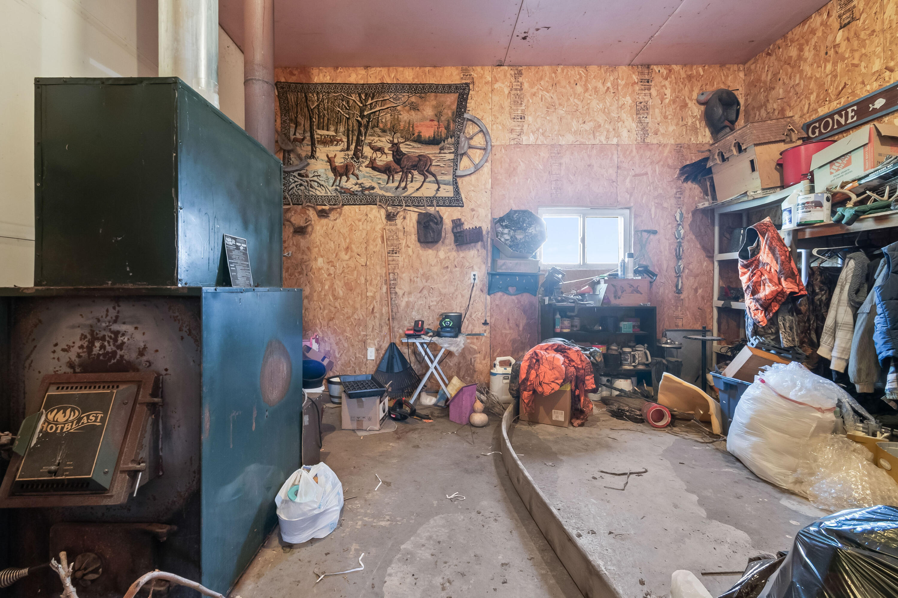 320 Jonesville Road Jonesville, MI 49250 - Photo 30 of 54 wood burner room