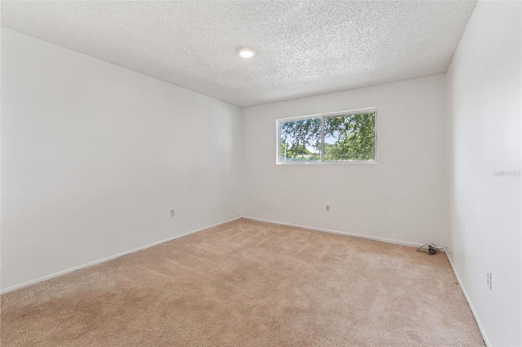 916 Lake Destiny Road, Unit E Altamonte Springs, FL 32714 - Photo 11 of 26 an empty room with windows