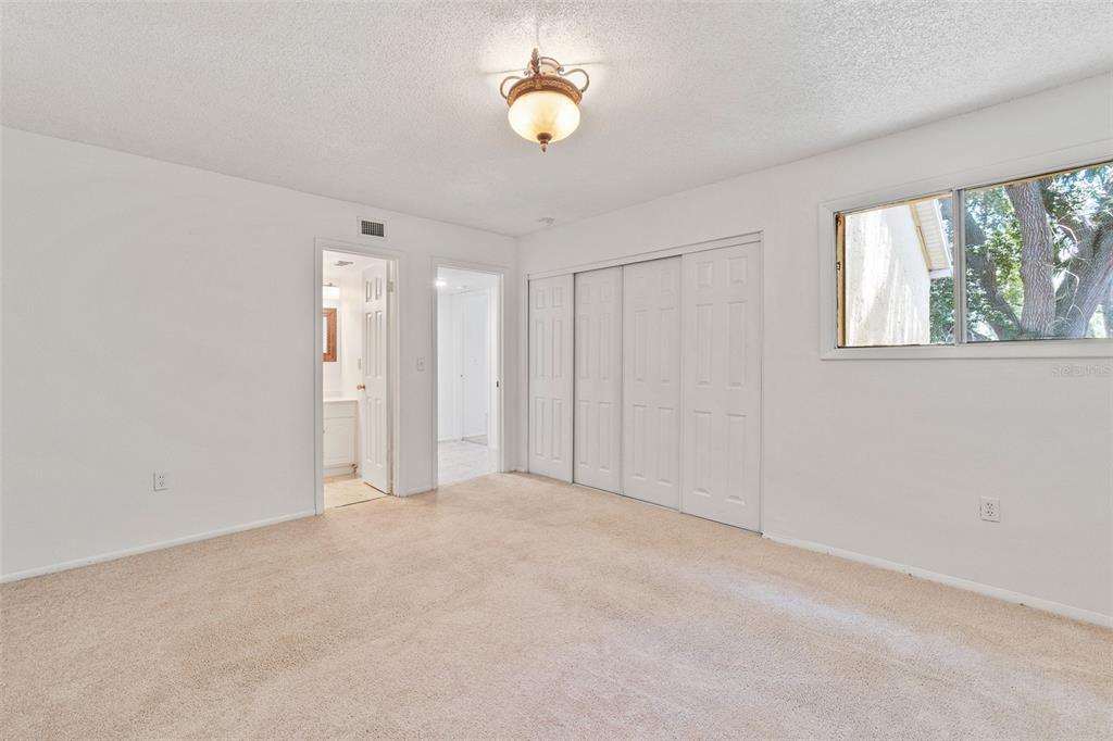 916 Lake Destiny Road, Unit E Altamonte Springs, FL 32714 - Photo 13 of 26 a view of an empty room with a window