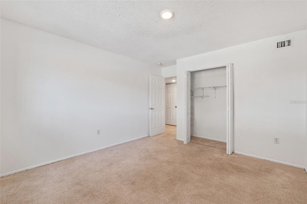 916 Lake Destiny Road, Unit E Altamonte Springs, FL 32714 - Photo 16 of 26 an empty room with an entryway