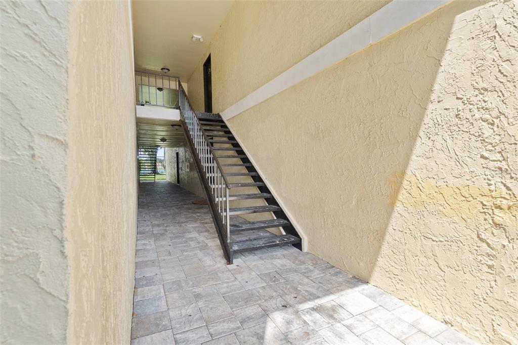916 Lake Destiny Road, Unit E Altamonte Springs, FL 32714 - Photo 2 of 26 a view of an entryway with staircase