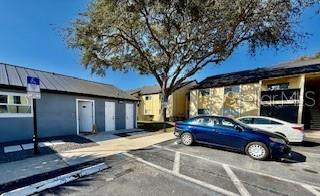 916 Lake Destiny Road, Unit E Altamonte Springs, FL 32714 - Photo 21 of 26 a car parked in front of a house