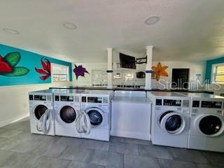 916 Lake Destiny Road, Unit E Altamonte Springs, FL 32714 - Photo 22 of 26 a utility room with dryer and washer