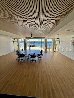 916 Lake Destiny Road, Unit E Altamonte Springs, FL 32714 - Photo 24 of 26 an empty room with furniture and wooden floor