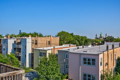 a view of a city from a balcony
