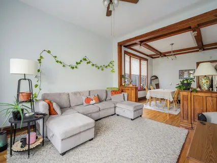 a living room with furniture and a window