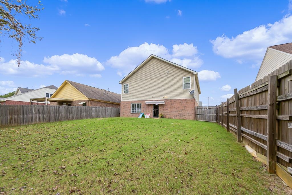 885 Ruby Creek Cove Memphis, TN 38109 - Photo 25 of 25 a house view with a garden space