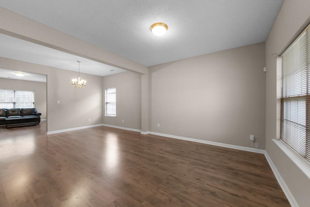 885 Ruby Creek Cove Memphis, TN 38109 - Photo 3 of 25 a view of a room window and wooden floor