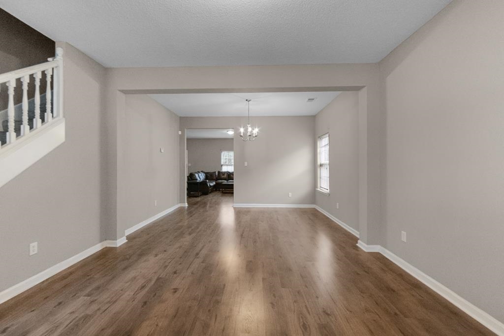 885 Ruby Creek Cove Memphis, TN 38109 - Photo 4 of 25 a view of empty room with wooden floor