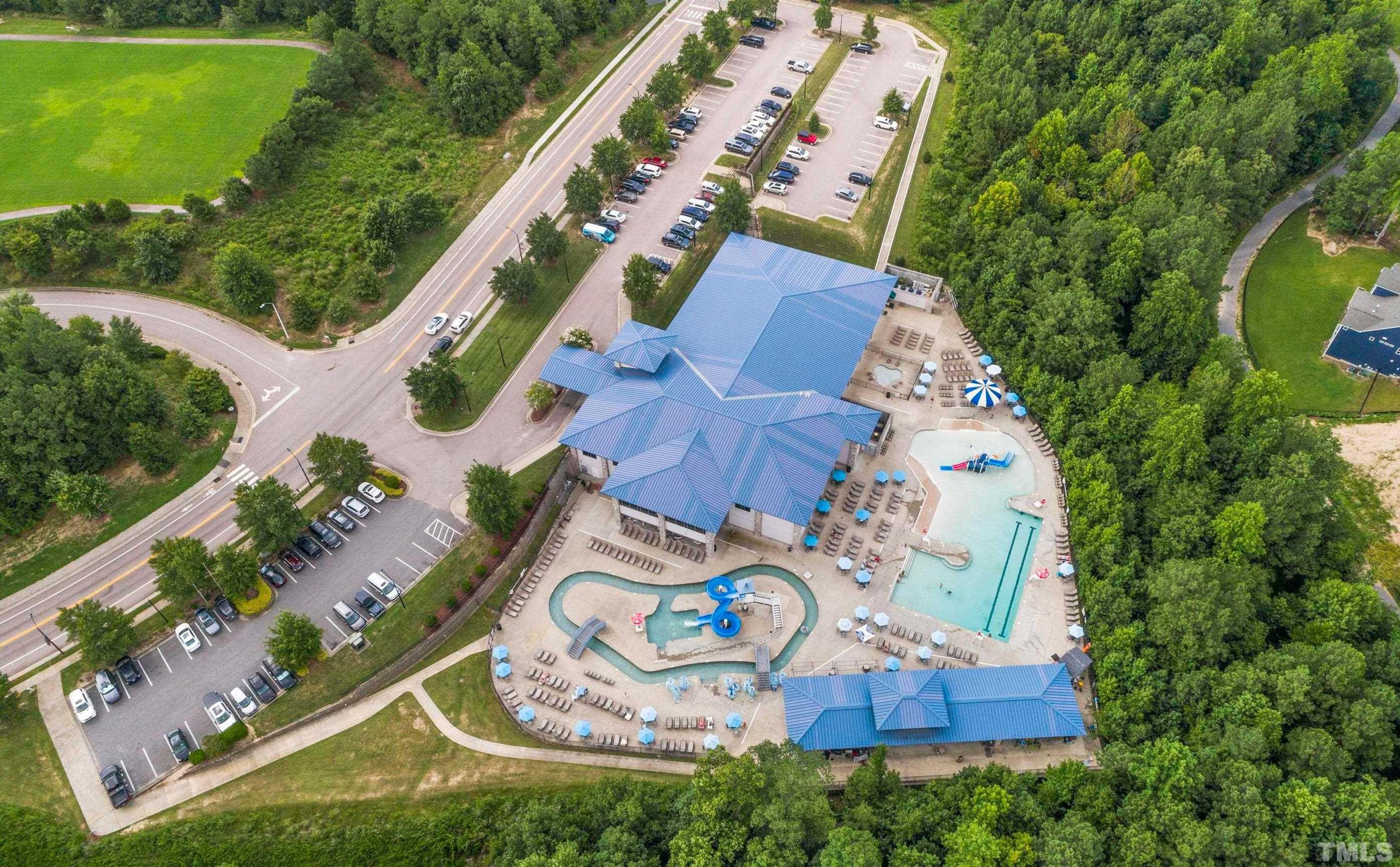 1004 Grand Ridge Drive Rolesville, NC 27571 - Photo 20 of 24 an aerial view of a house with a garden and outdoor seating