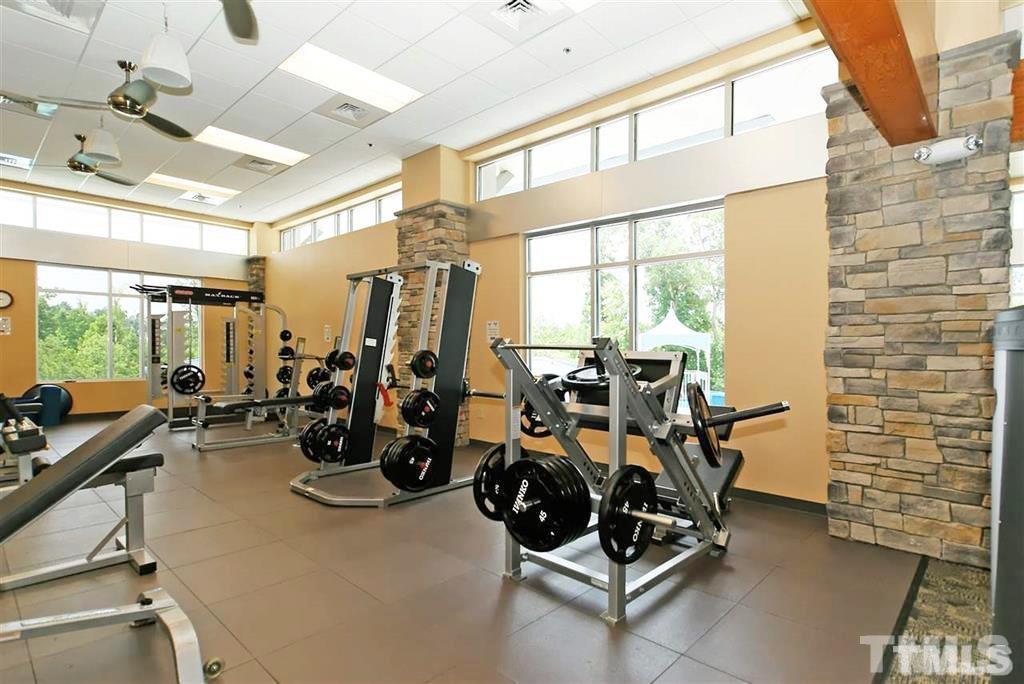 1004 Grand Ridge Drive Rolesville, NC 27571 - Photo 23 of 24 a view of a room with gym equipment