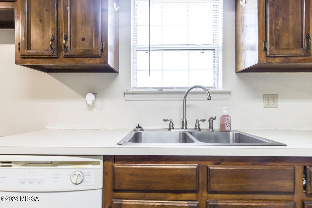 118 Toomer Road Perry, GA 31069 - Photo 16 of 30 a kitchen with a sink and a window