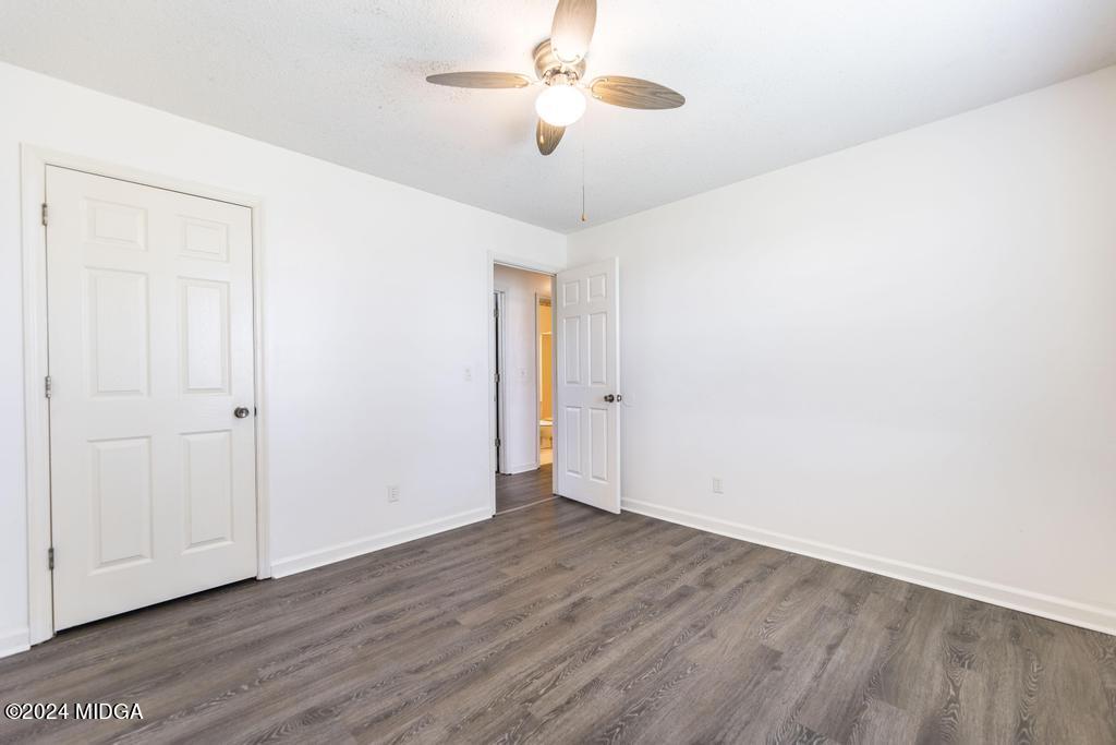 118 Toomer Road Perry, GA 31069 - Photo 23 of 30 a view of an empty room with wooden floor
