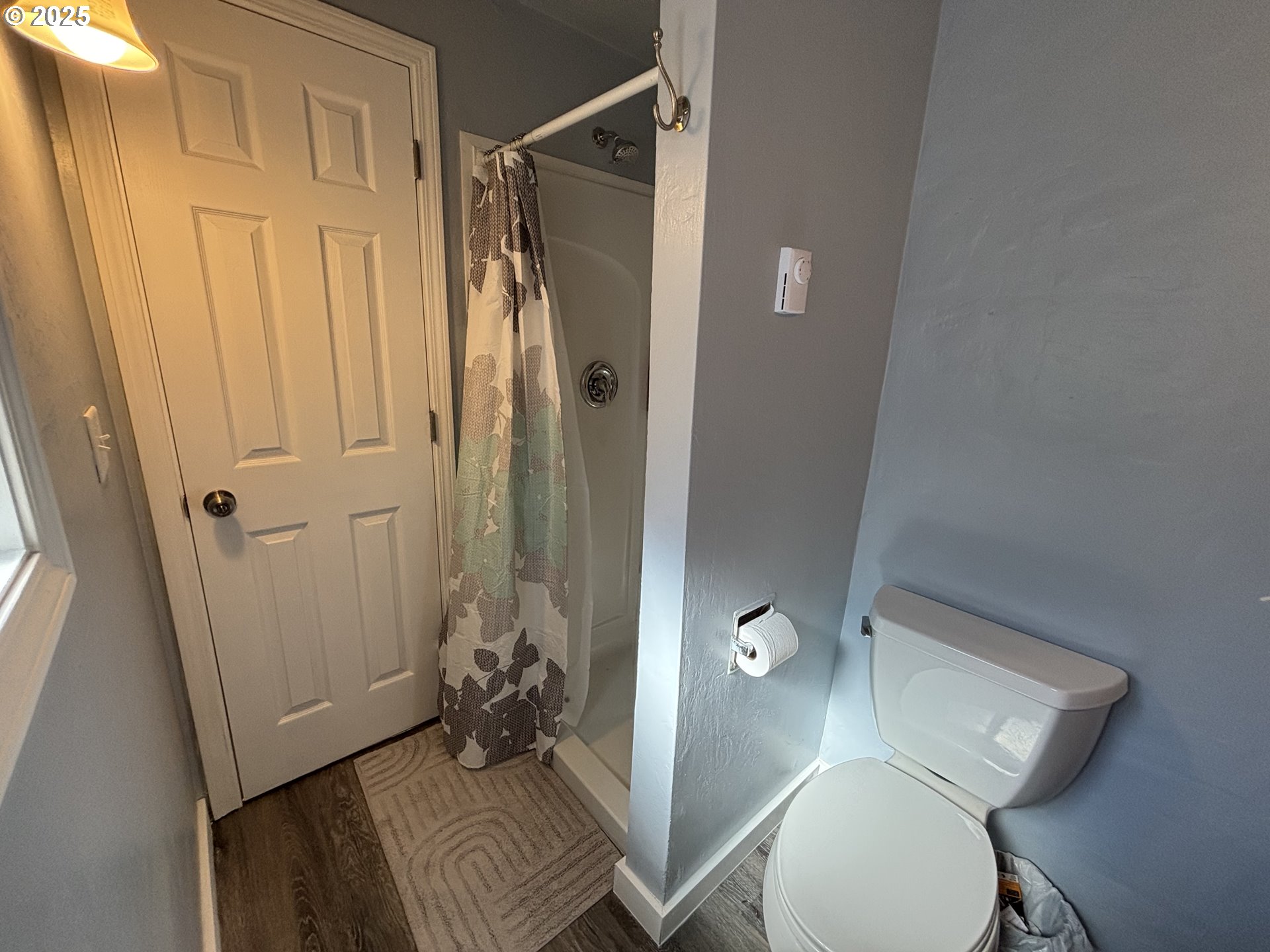 7066 Aster Street Springfield, OR 97478 - Photo 29 of 46 a bathroom with a sink and mirror