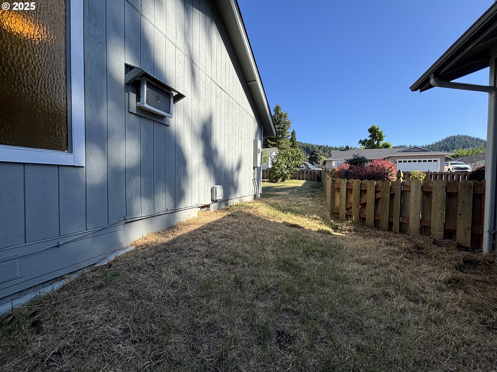 7066 Aster Street Springfield, OR 97478 - Photo 40 of 46 a view of outdoor space and deck