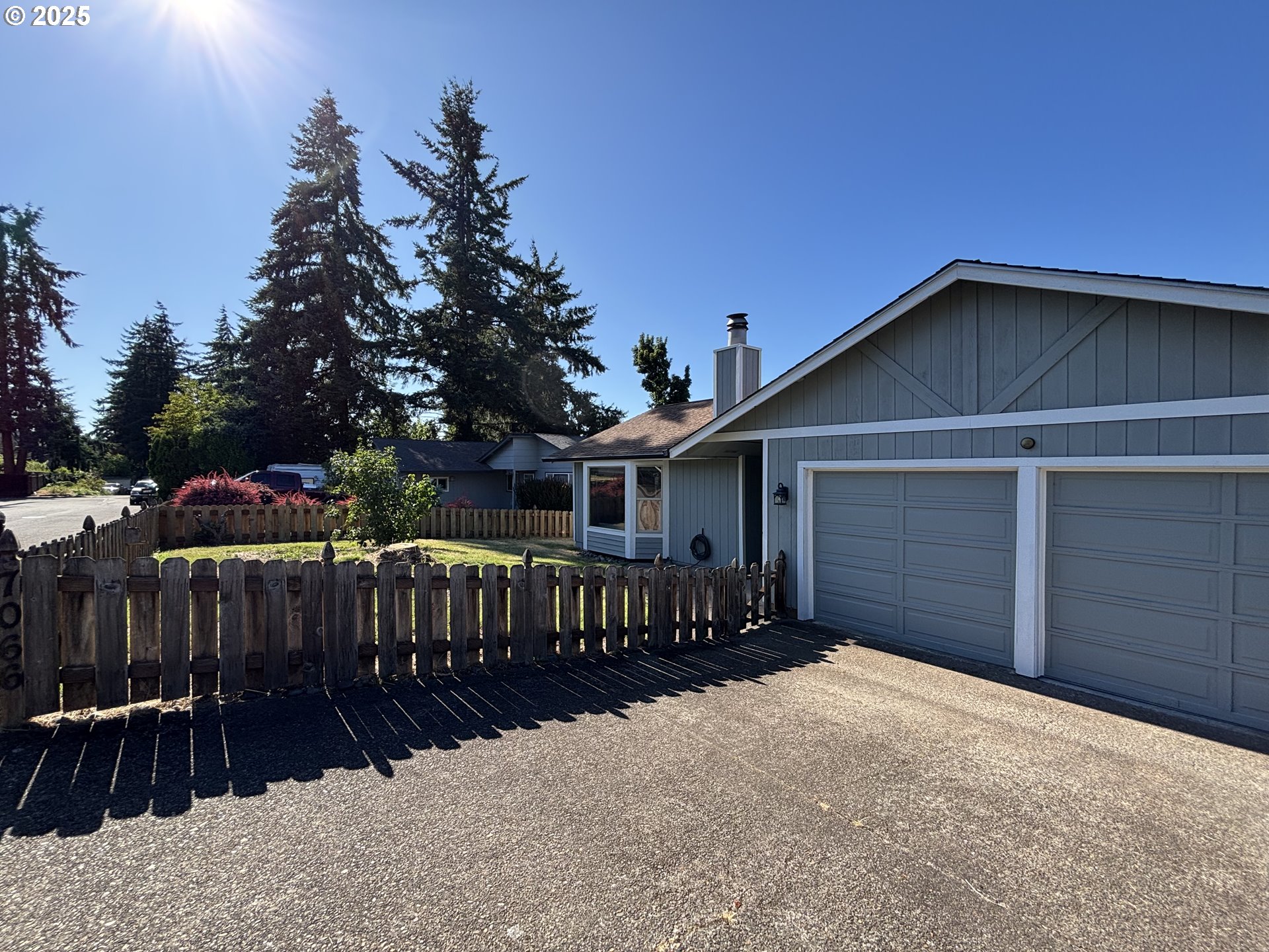 7066 Aster Street Springfield, OR 97478 - Photo 45 of 46 a view of a house with wooden fence