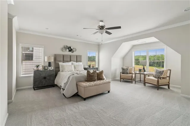 a bed room with furniture and a window