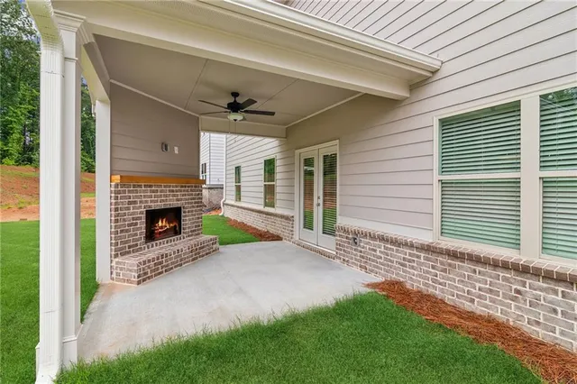 a view of a porch with a fireplace