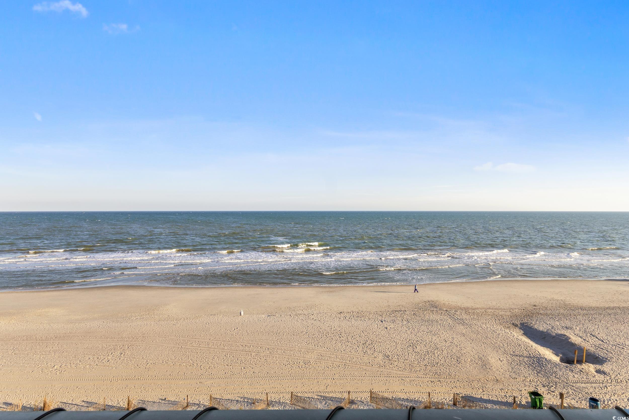 1207 South Ocean Boulevard, Unit 20603 Myrtle Beach, SC 29577 - Photo 19 of 19 Balcony featuring view of water and beach and an AC wall unit