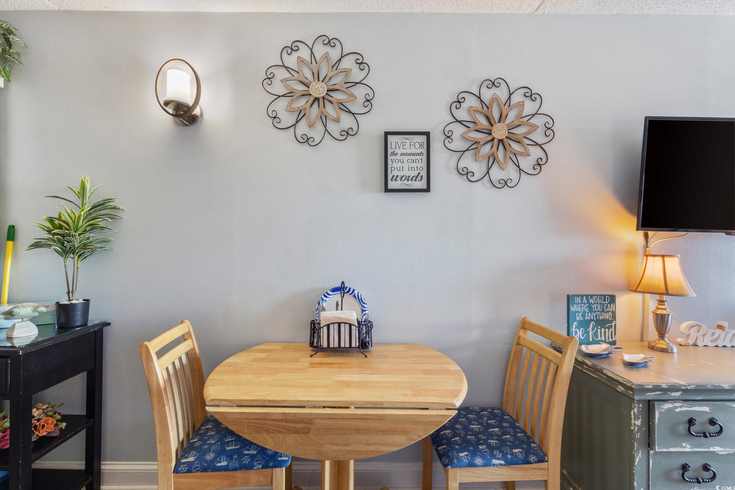 1207 South Ocean Boulevard, Unit 20603 Myrtle Beach, SC 29577 - Photo 5 of 19 Dining room featuring baseboards