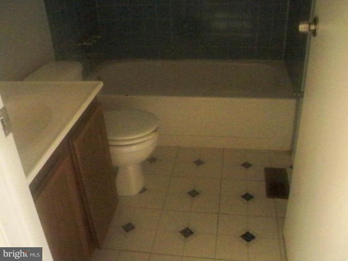 10501 Apple Ridge Road Gaithersburg, MD 20886 - Photo 11 of 15 a bathroom with a toilet and a shower