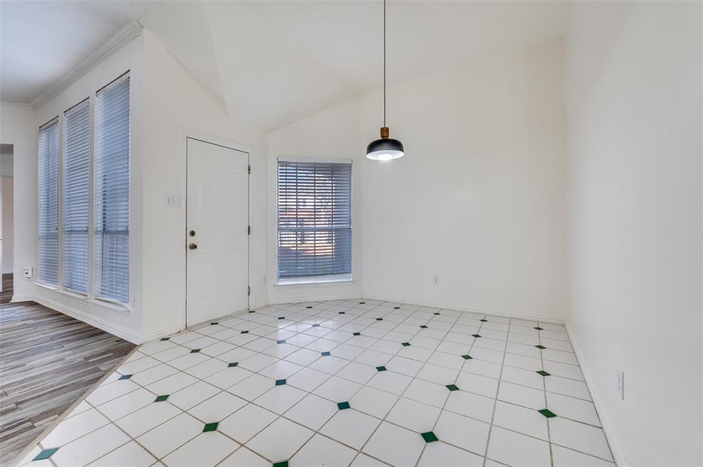 9611 Cliffside Drive Irving, TX 75063 - Photo 13 of 24 an empty room with white walls