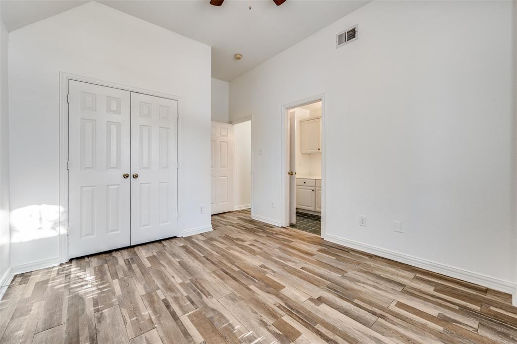 9611 Cliffside Drive Irving, TX 75063 - Photo 20 of 24 a view of empty room with wooden floor