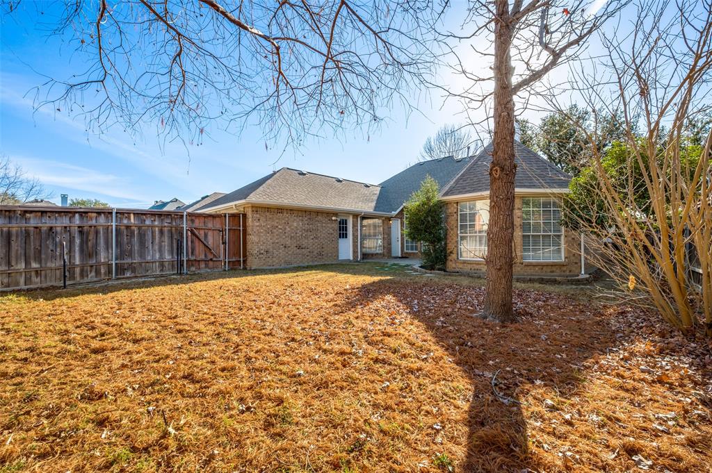 9611 Cliffside Drive Irving, TX 75063 - Photo 24 of 24 a house with trees in front of it
