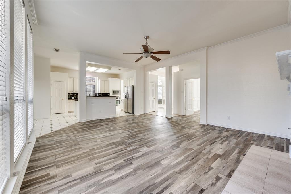 9611 Cliffside Drive Irving, TX 75063 - Photo 8 of 24 a view of a kitchen with a sink and a refrigerator