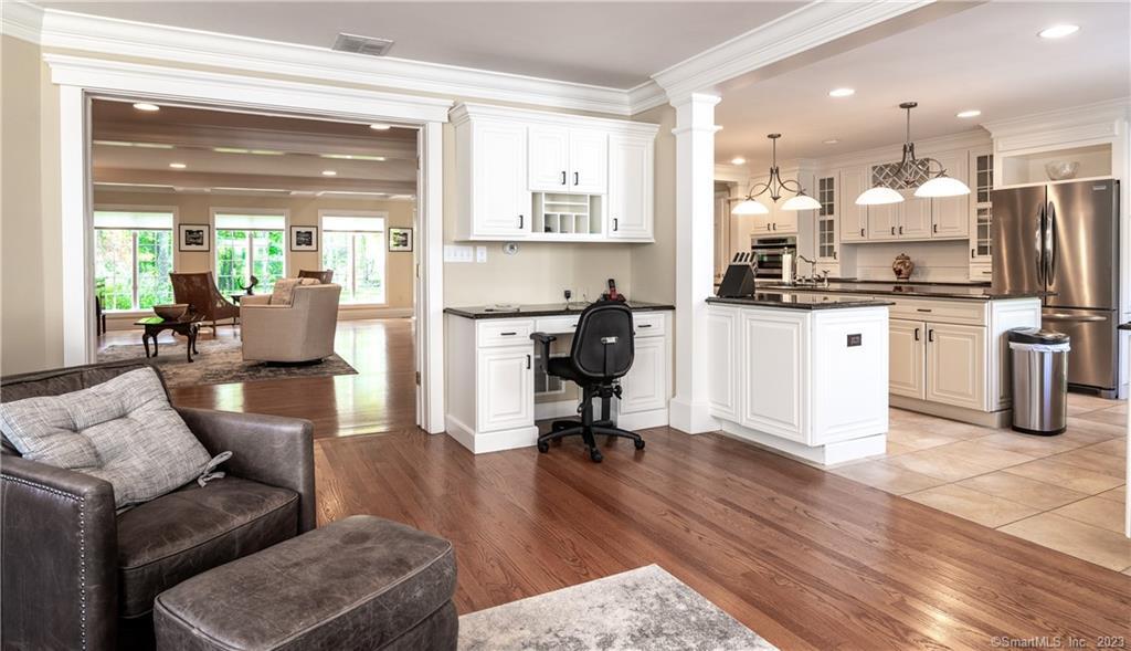 12 West Mountain Road Sharon, CT 06069 - Photo 14 of 33 a living room with furniture a kitchen view and a large window