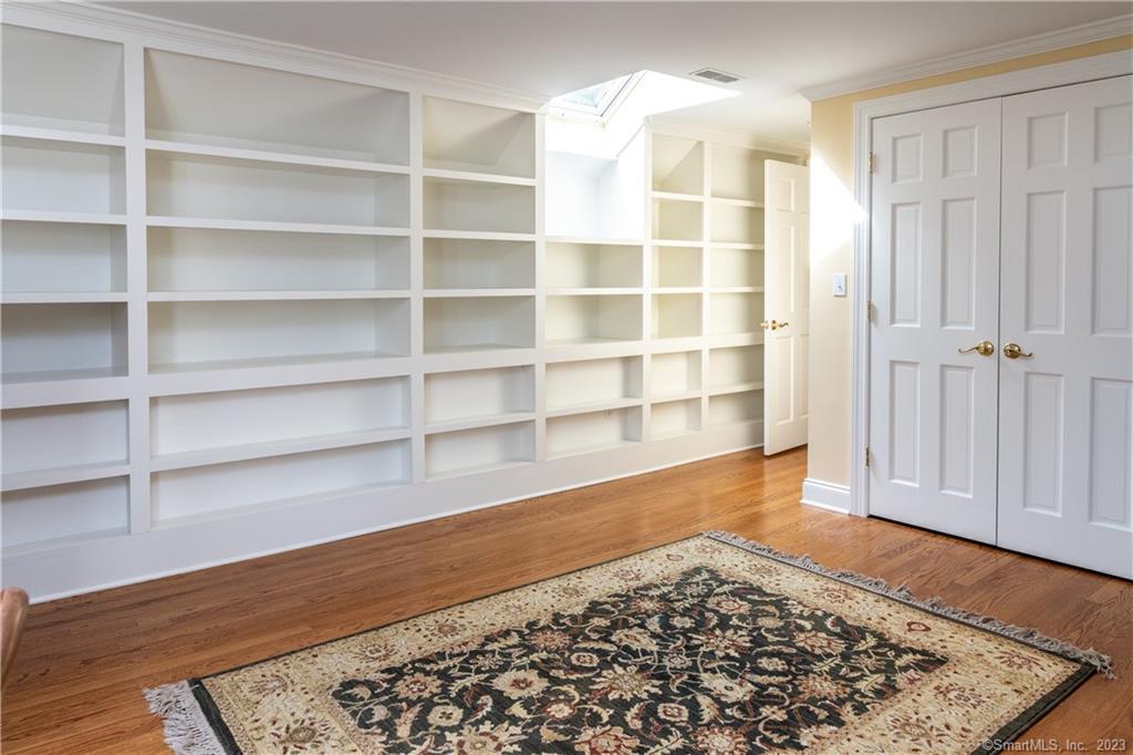 12 West Mountain Road Sharon, CT 06069 - Photo 24 of 33 a view of a room with wooden floor and cabinet