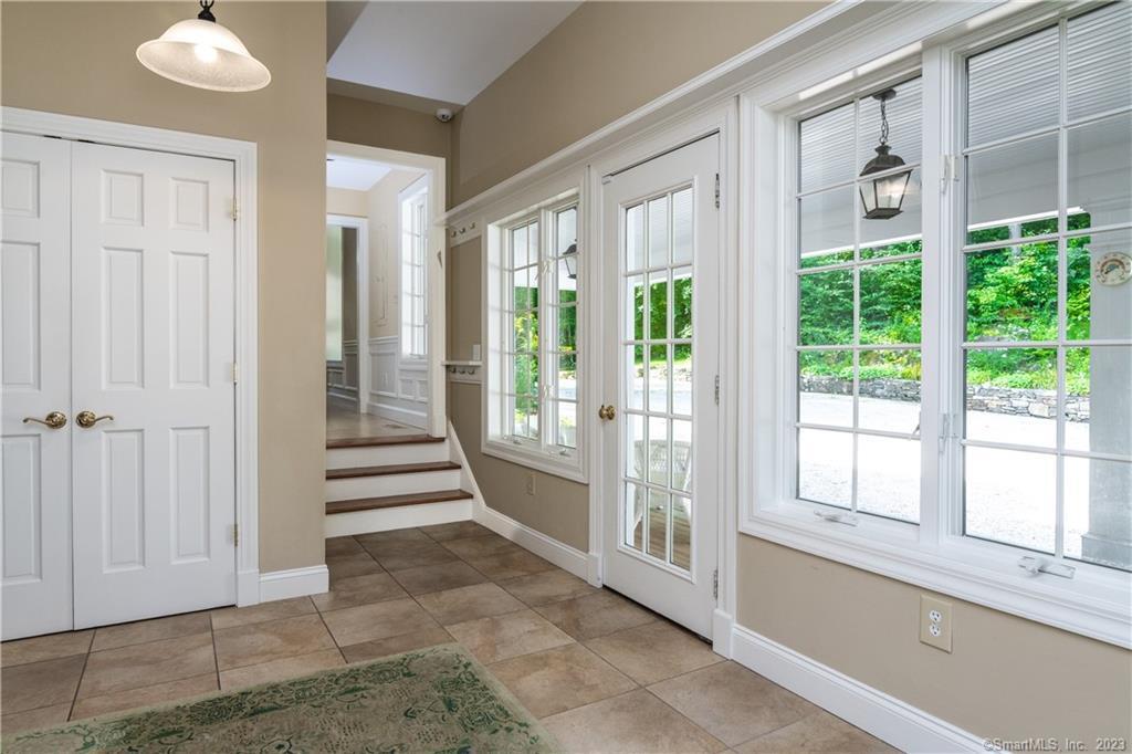 12 West Mountain Road Sharon, CT 06069 - Photo 25 of 33 a view of a glass door with a porch