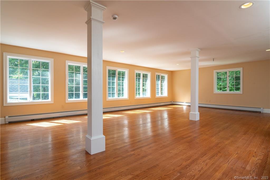 12 West Mountain Road Sharon, CT 06069 - Photo 28 of 33 a view of empty room with wooden floor and fan