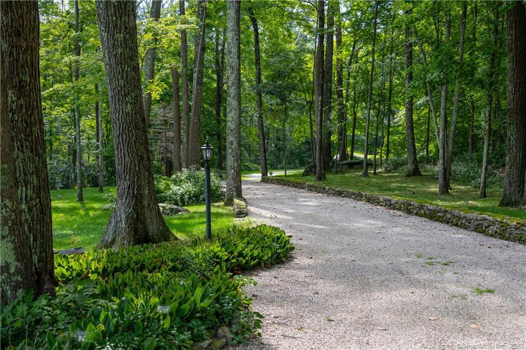 12 West Mountain Road Sharon, CT 06069 - Photo 3 of 33 a view of a park with large trees