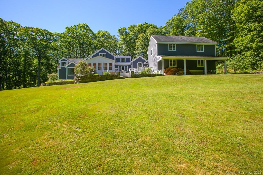 12 West Mountain Road Sharon, CT 06069 - Photo 33 of 33 a front view of a house with a big yard
