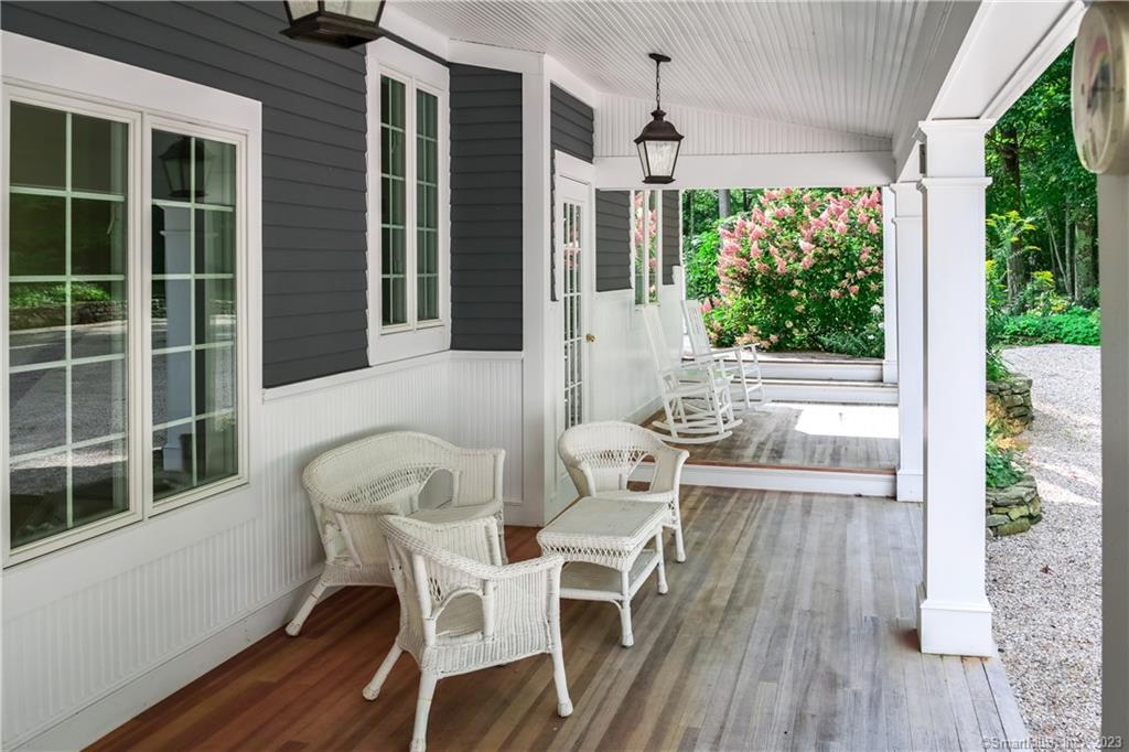 12 West Mountain Road Sharon, CT 06069 - Photo 5 of 33 a view of a dining room with furniture and wooden floor