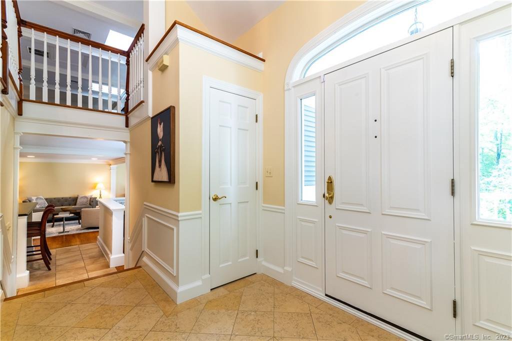 12 West Mountain Road Sharon, CT 06069 - Photo 6 of 33 a view of a hallway with entryway chandelier and living room