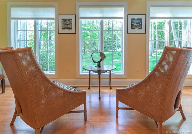 a living room with furniture and a window