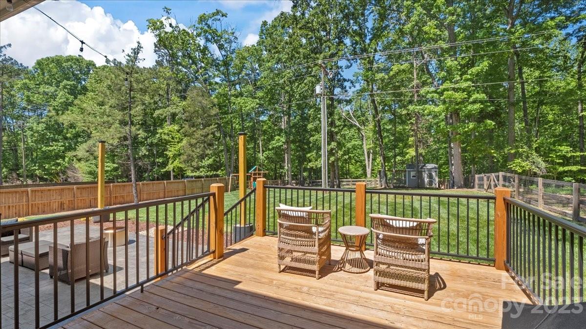 10154 Jim Sossoman Road Midland, NC 28107 - Photo 11 of 44 a view of a chair and table on the wooden floor
