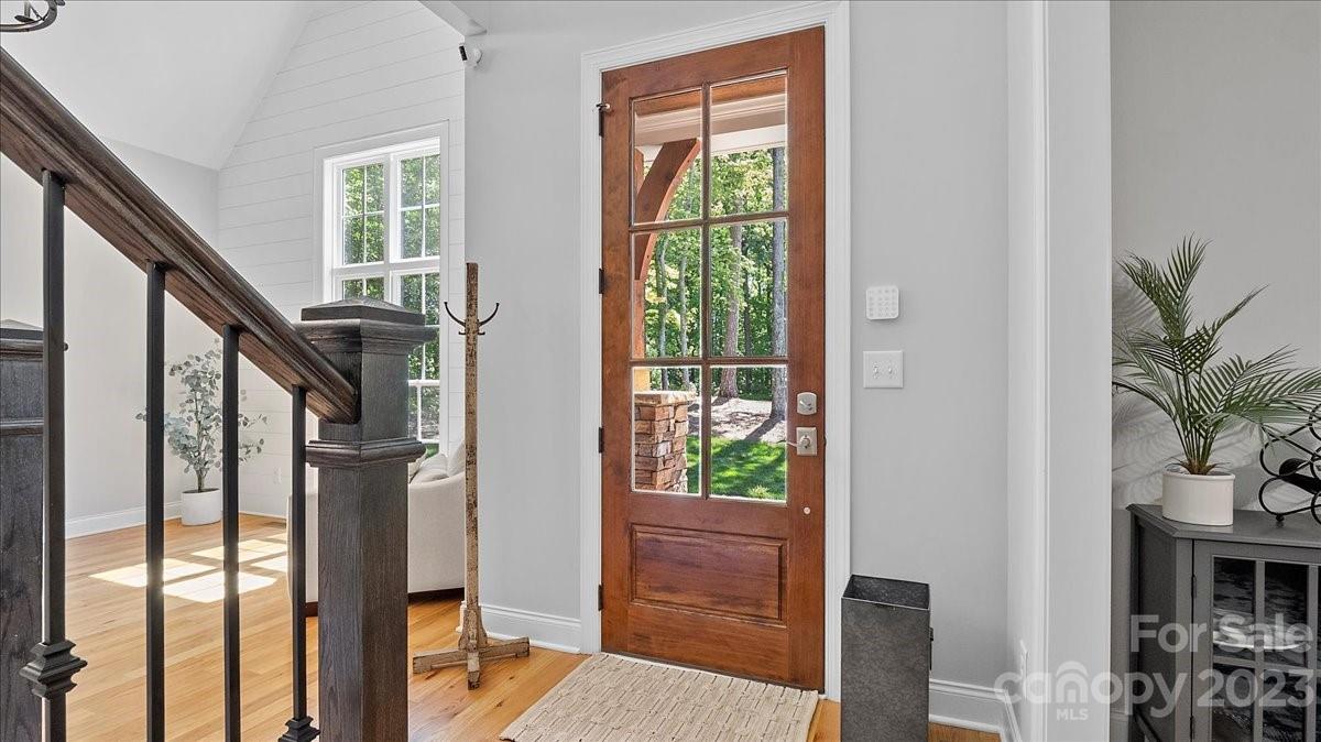 10154 Jim Sossoman Road Midland, NC 28107 - Photo 14 of 44 a view of an entryway with wooden floor and door