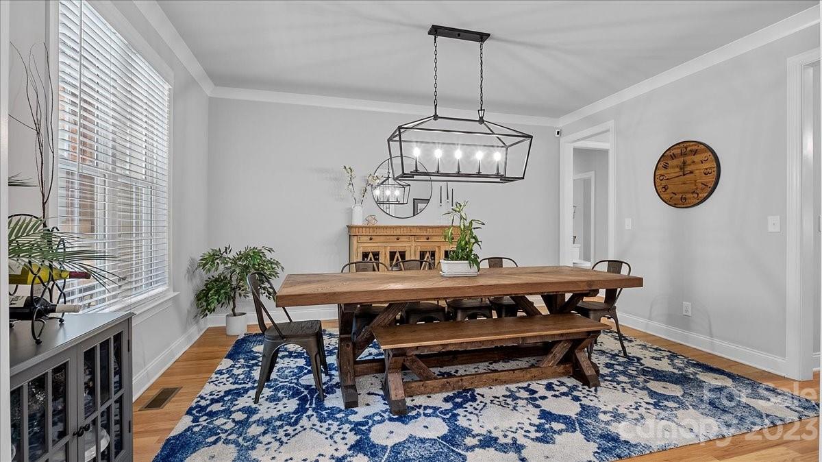 10154 Jim Sossoman Road Midland, NC 28107 - Photo 17 of 44 a view of a room with furniture and wooden floor