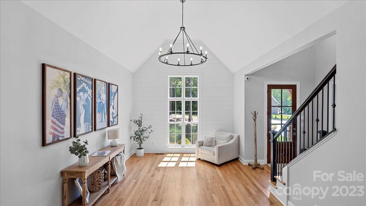 10154 Jim Sossoman Road Midland, NC 28107 - Photo 19 of 44 a view of an entryway with wooden floor