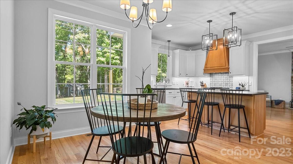 10154 Jim Sossoman Road Midland, NC 28107 - Photo 22 of 44 a view of a dining room with furniture window and outside view