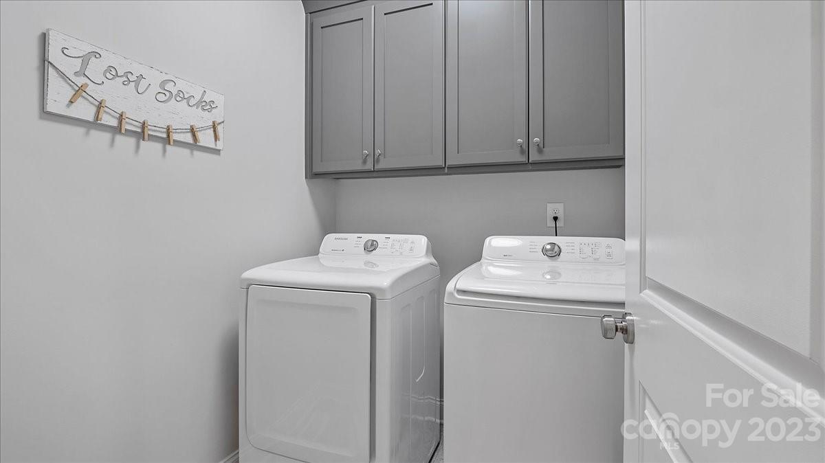 10154 Jim Sossoman Road Midland, NC 28107 - Photo 31 of 44 a utility room with dryer and washer