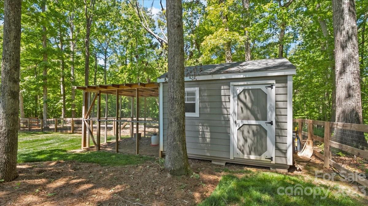 10154 Jim Sossoman Road Midland, NC 28107 - Photo 44 of 44 a view of a barn with a yard