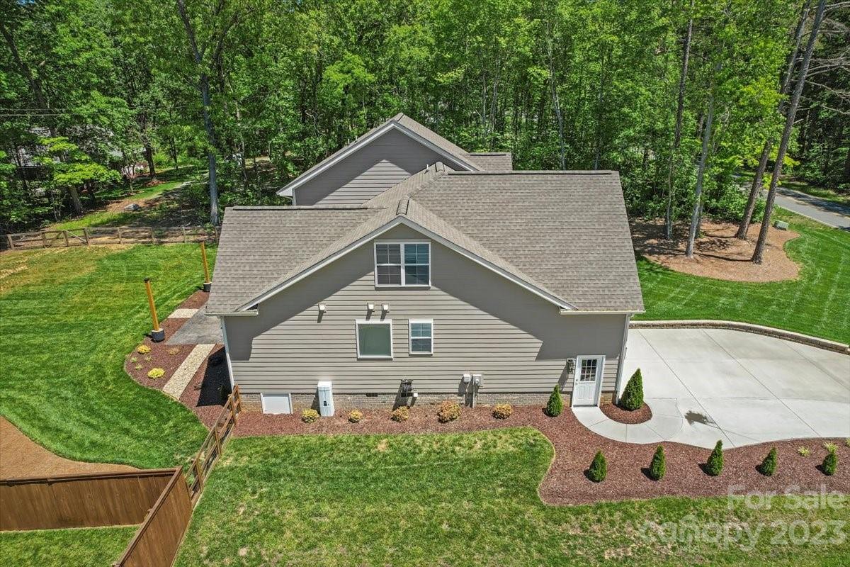 10154 Jim Sossoman Road Midland, NC 28107 - Photo 5 of 44 a house view with a outdoor space