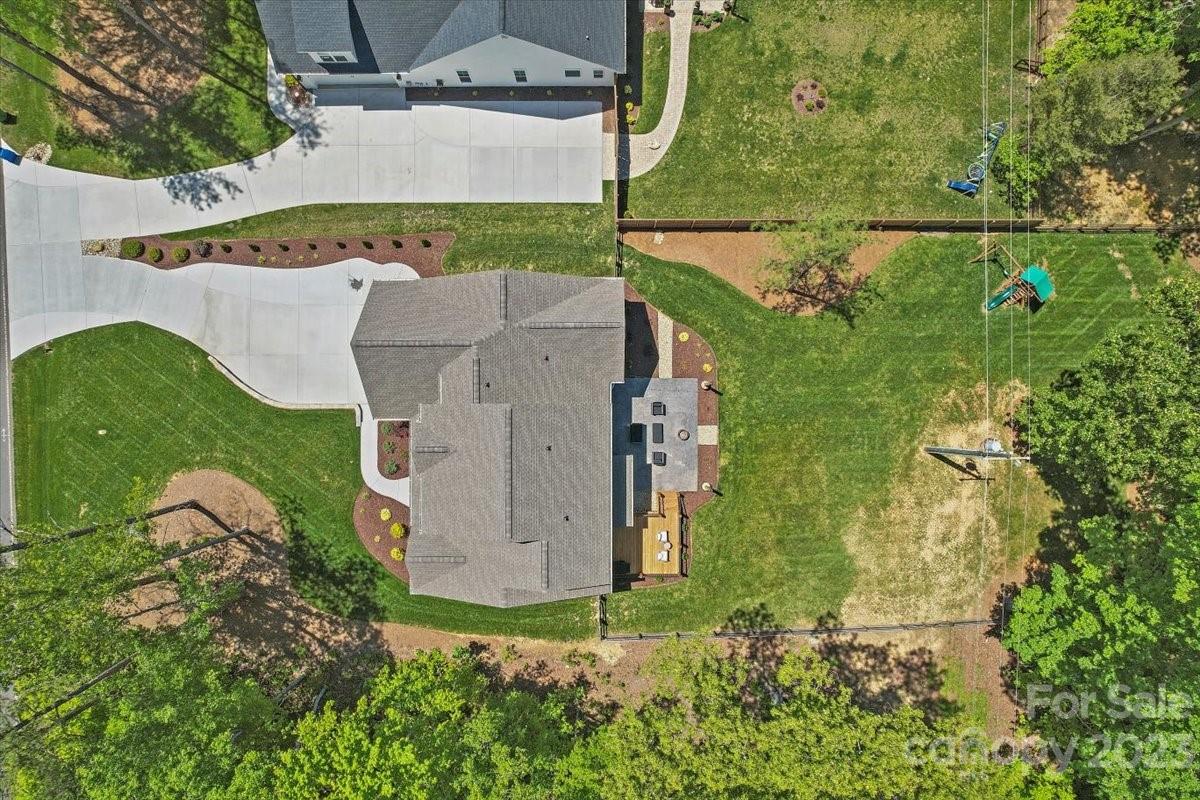 10154 Jim Sossoman Road Midland, NC 28107 - Photo 6 of 44 an aerial view of a house with a yard